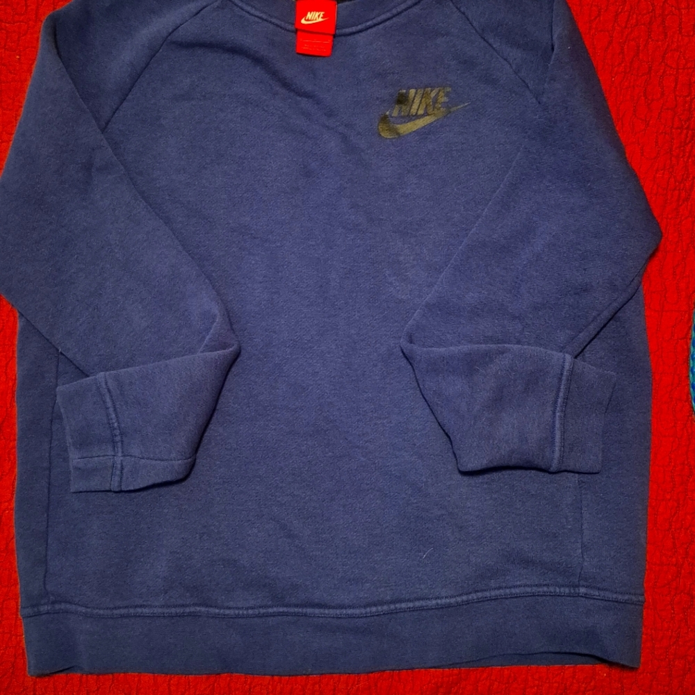 Nike sweat shirt . Medium adult. Drk blue. Black Nike emblem left shoulder area